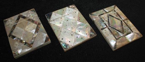 Three abalone and mother of pearl card cases, each with floral engraving to lozenges